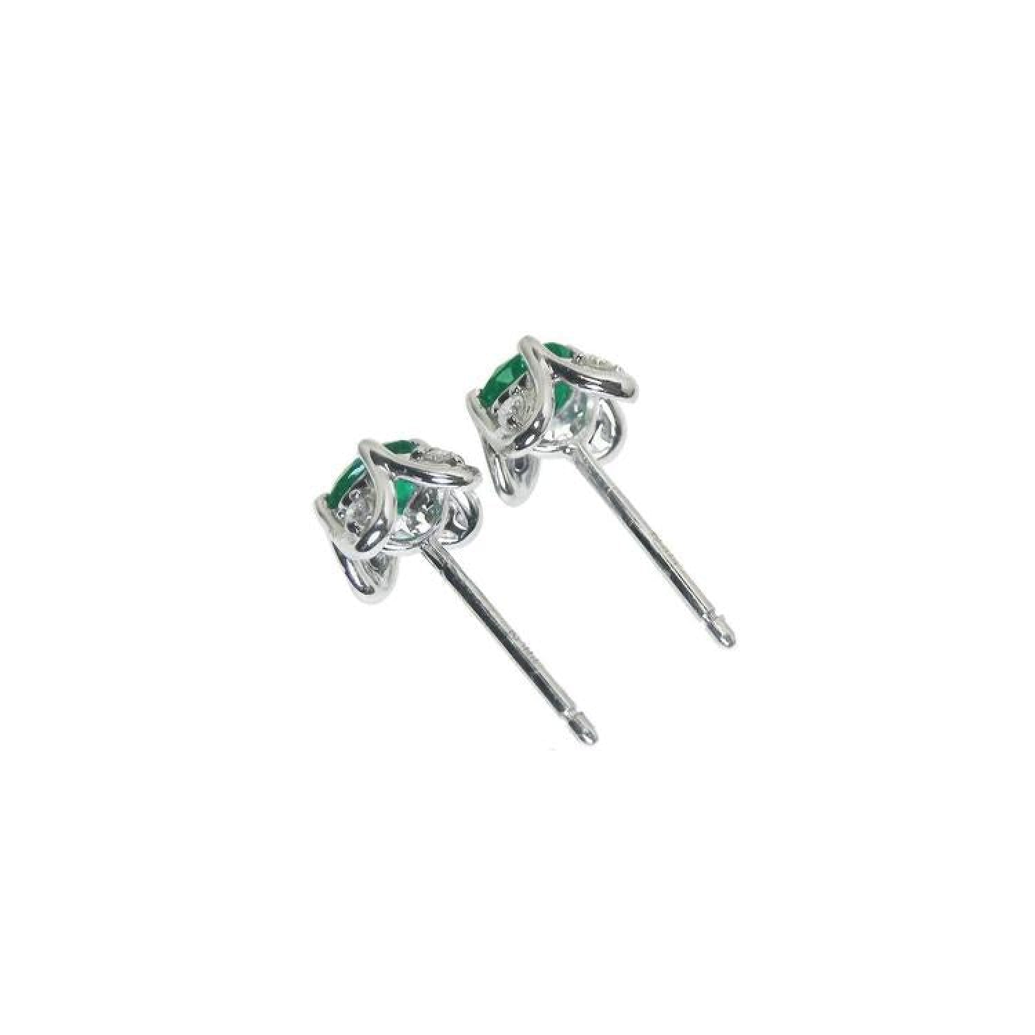 14K white gold emerald and diamond tulip stud earrings with push backs.