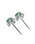 14k white gold Emerald and diamond tulip stud earrings, tilted position for an underside view.