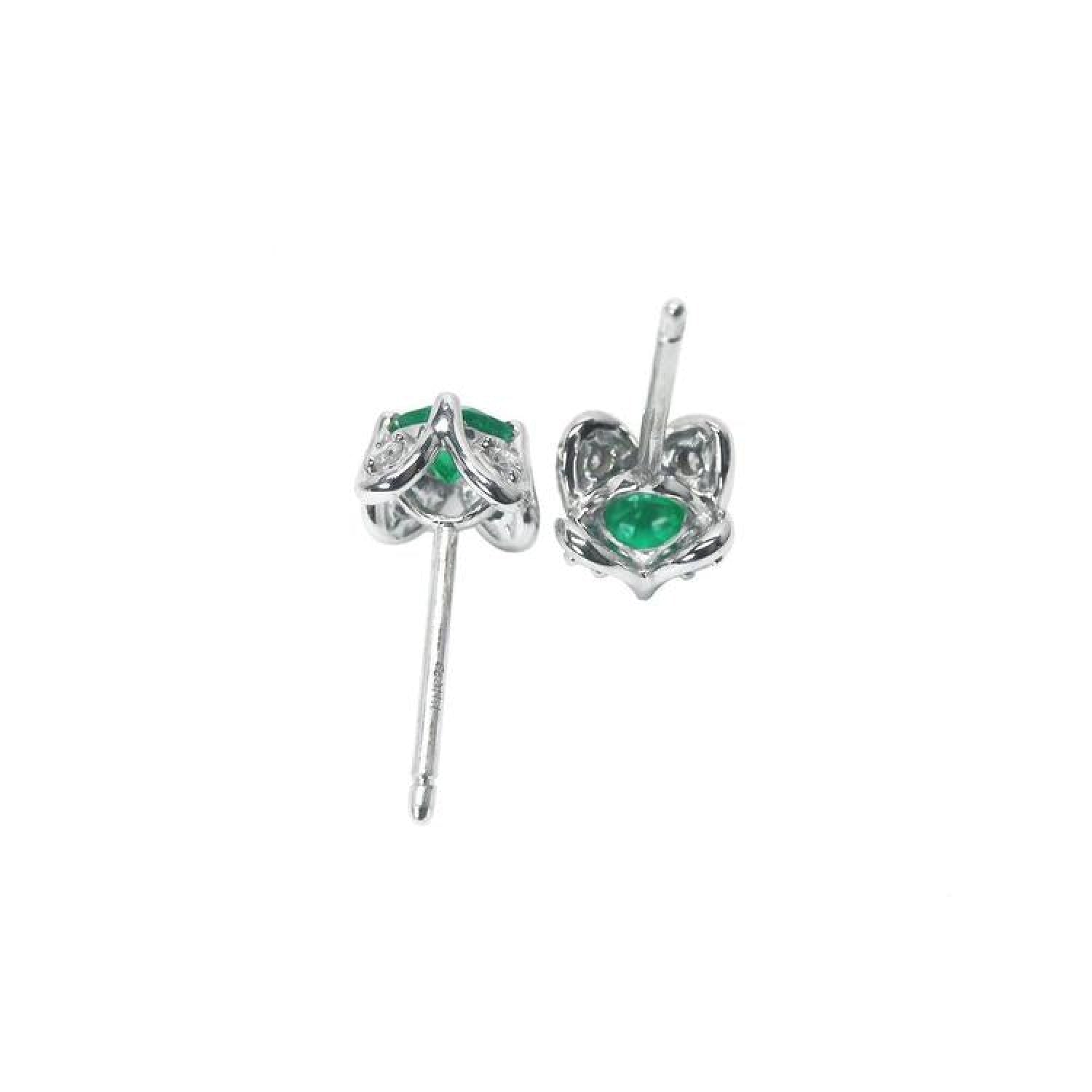 14K white gold emerald and diamond tulip stud earrings with push backs.