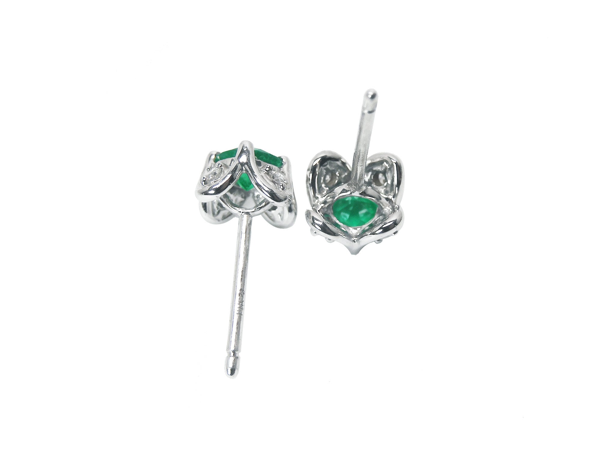 Upside down of pair of a genuine Colombian emerald tulip stud earrings to display underside details.