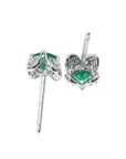 Upside down of pair of a genuine Colombian emerald tulip stud earrings to display underside details.