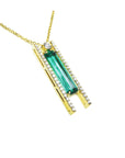 Yellow gold necklace with a natural baguette cut emerald gemstone pendant side natural diamonds.