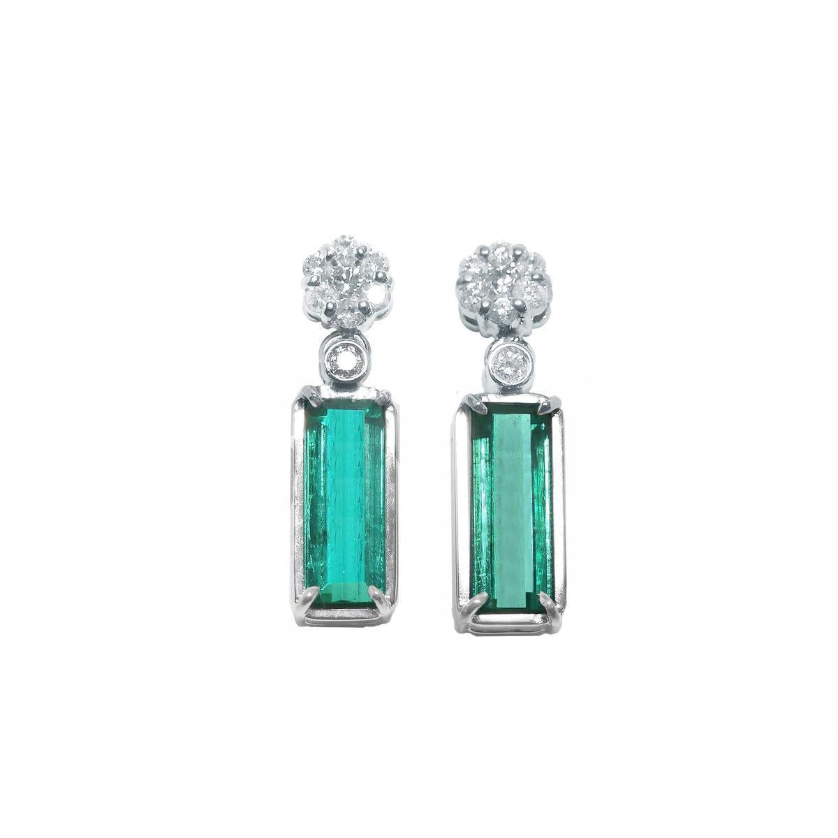 Pair of natural emerald earrings with cluster diamond on top, front position plain top view