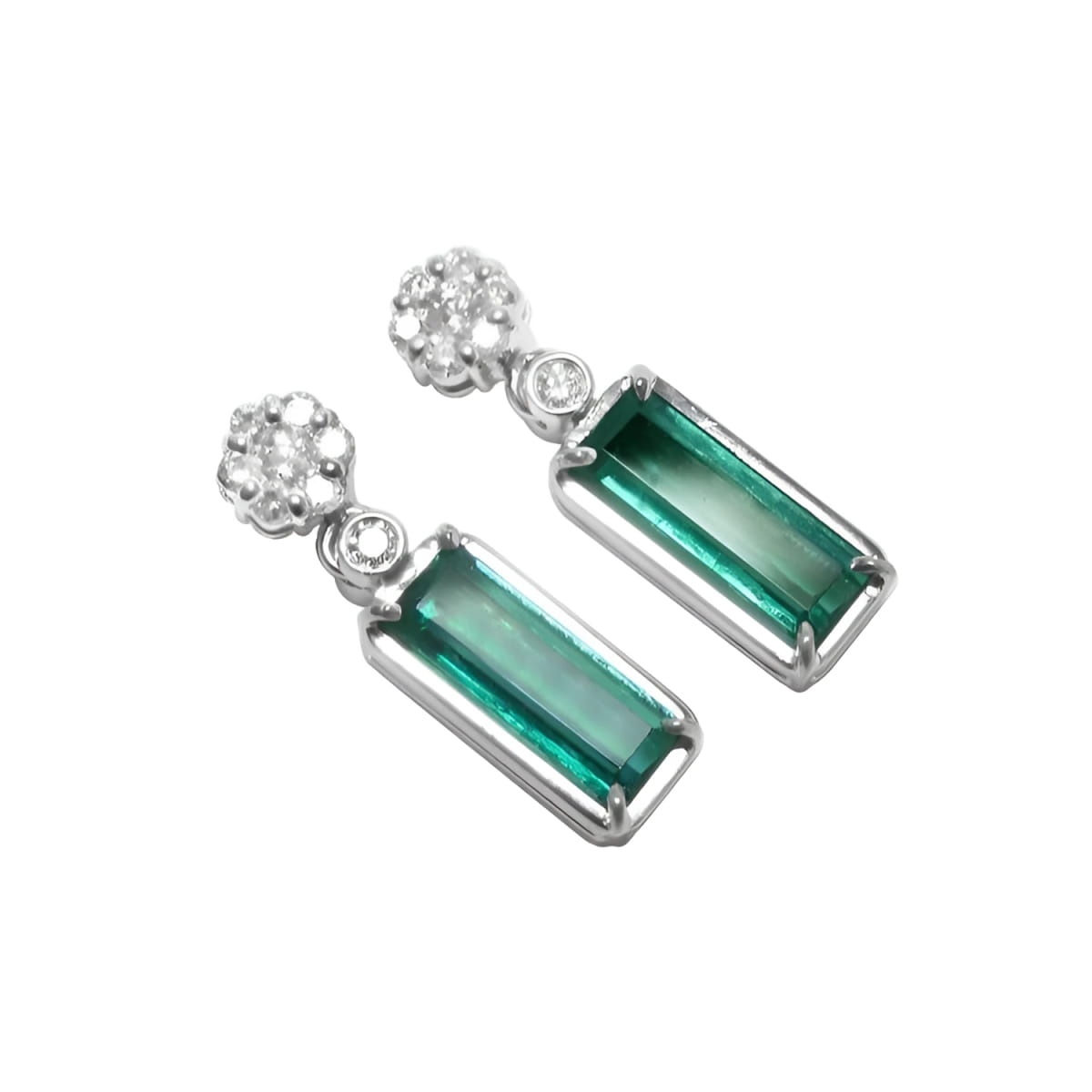 Pair of earrings with rectangular emeralds suspended fron a cluster diamond accents 14k white gold.