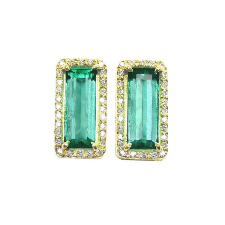 Pair of natural emerald stud earrings with yellow gold frames halo diamond on a white background