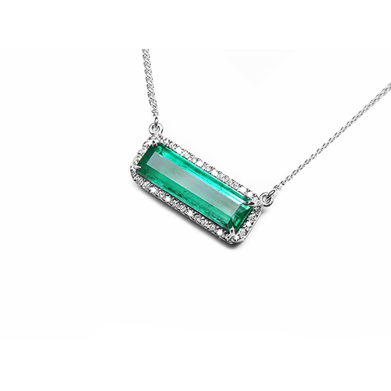 18K white gold necklace with a rectangular Colombian emerald and diamond halo, East-West design.