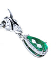 18K white gold enhancer necklace with a pear-shaped emerald and halo diamonds.