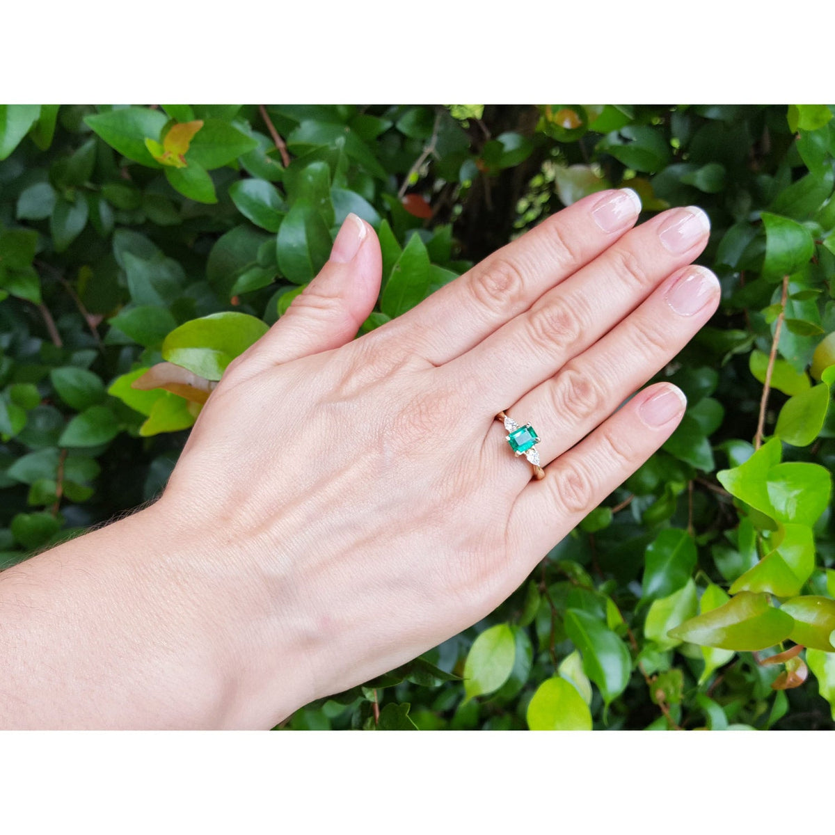 Emerald GIA Certified Ladies Ring 14K Gold featuring a Colombian emerald graded F1, elegantly showcased on a woman's hand.