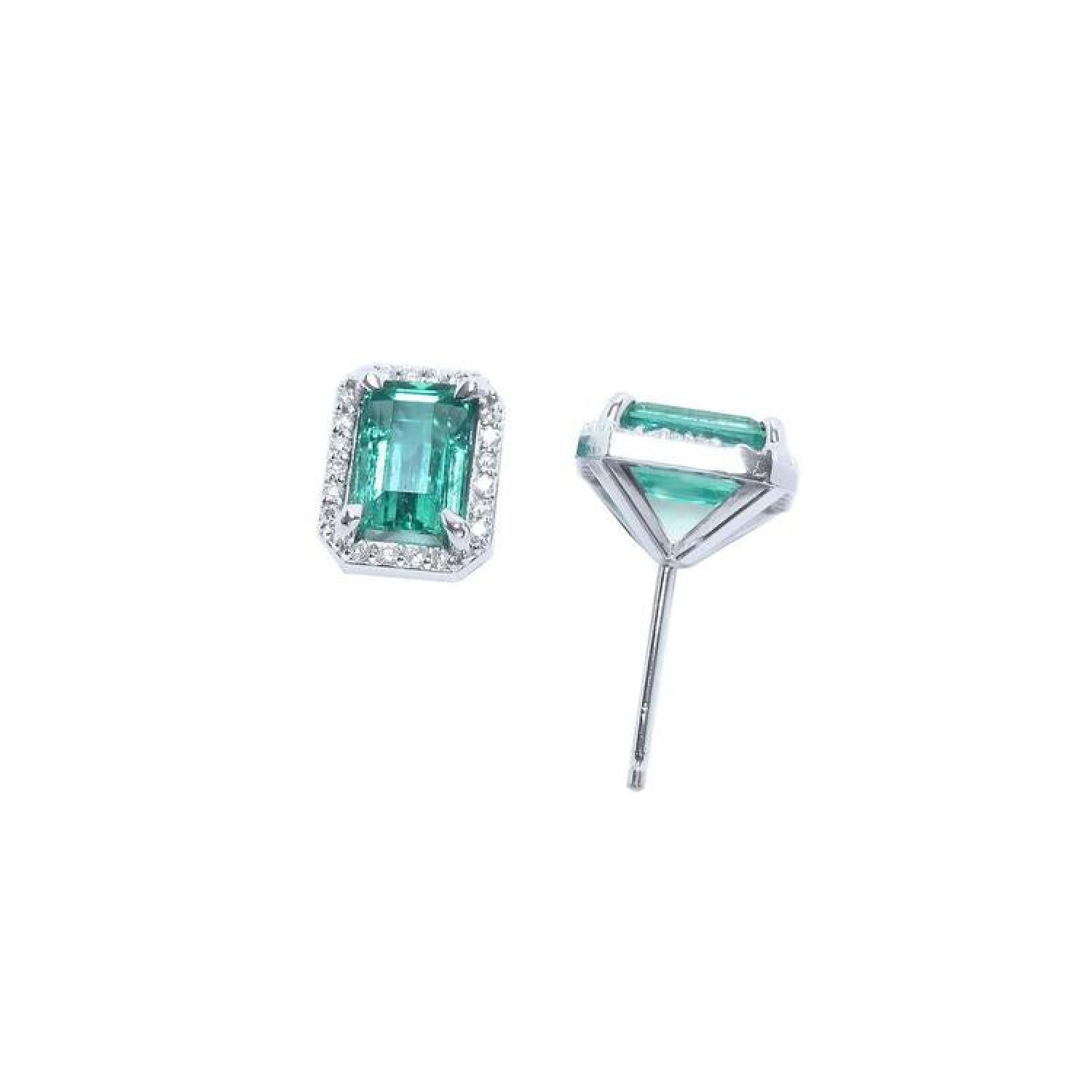 1.74 carat natural emerald-cut stud earrings with halo diamonds in 14K white gold.