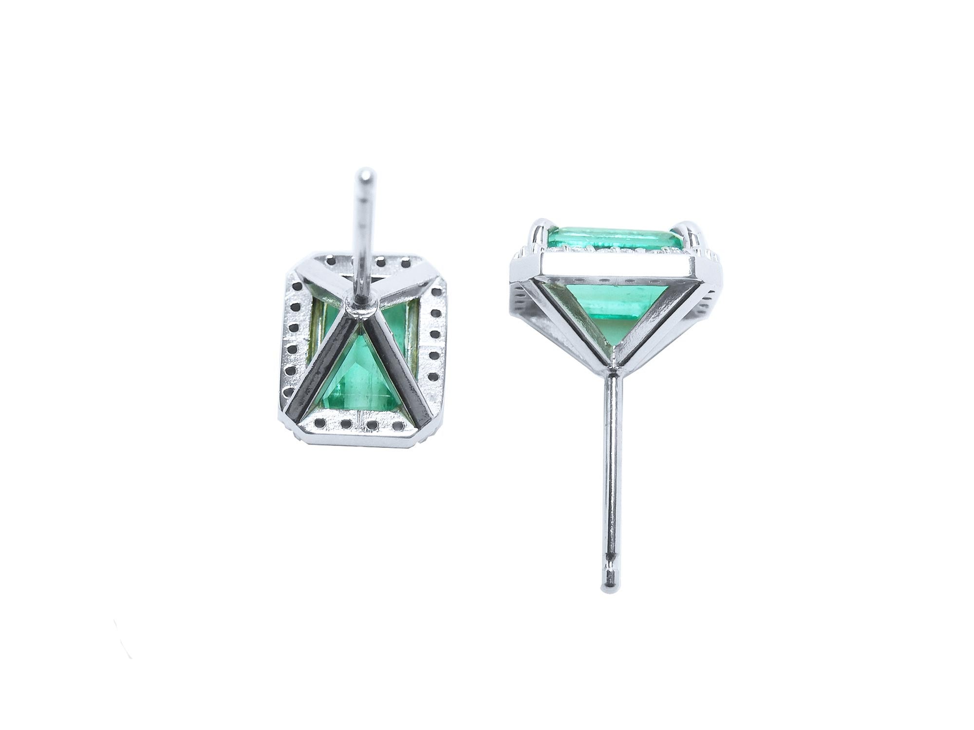 Pair of earrings with Colombian emeralds and white gold metalwork, upside down and underside view.