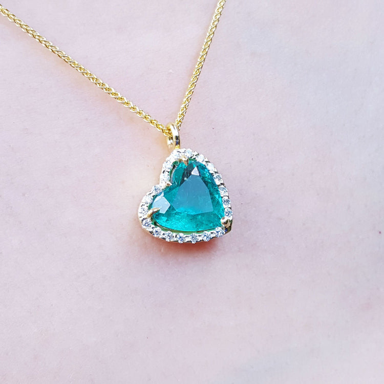 Emerald Muzo Colombian necklaces for sale tilted heart shaped halo natural diamond handcrafted in 18k yellow