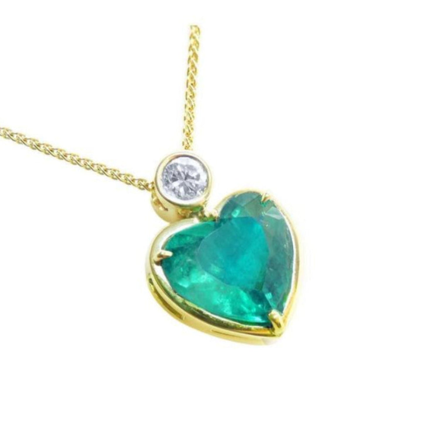 Heart-shaped emerald pendant with gold frame and diamond made of 18k yellow gold.