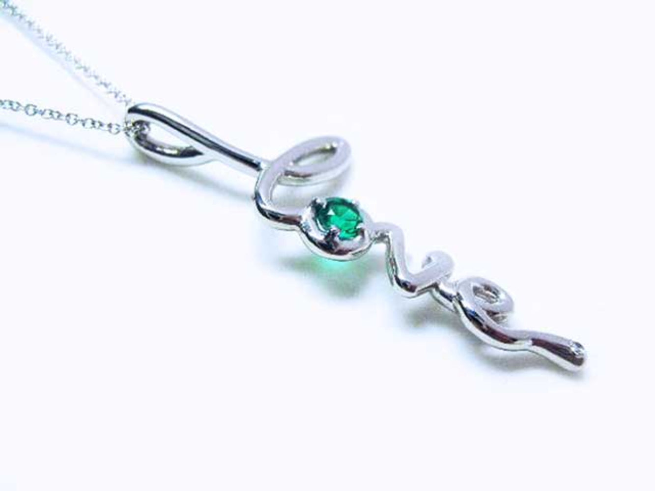 May birthstone emerald love pendant necklace in white gold top and side profile view.