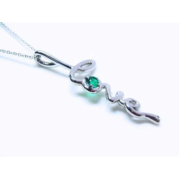 May birthstone emerald love pendant necklace in white gold top and side profile view.
