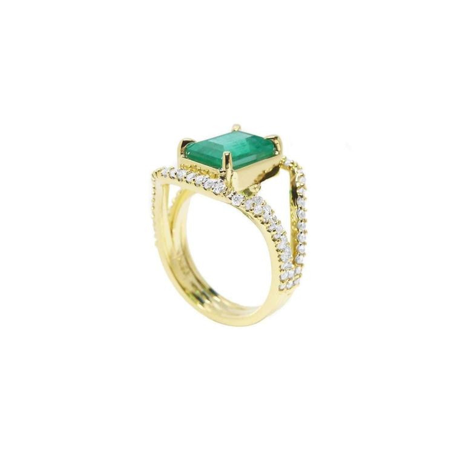 18K yellow gold engagement ring with a rectangular emerald and three rows of natural diamonds.