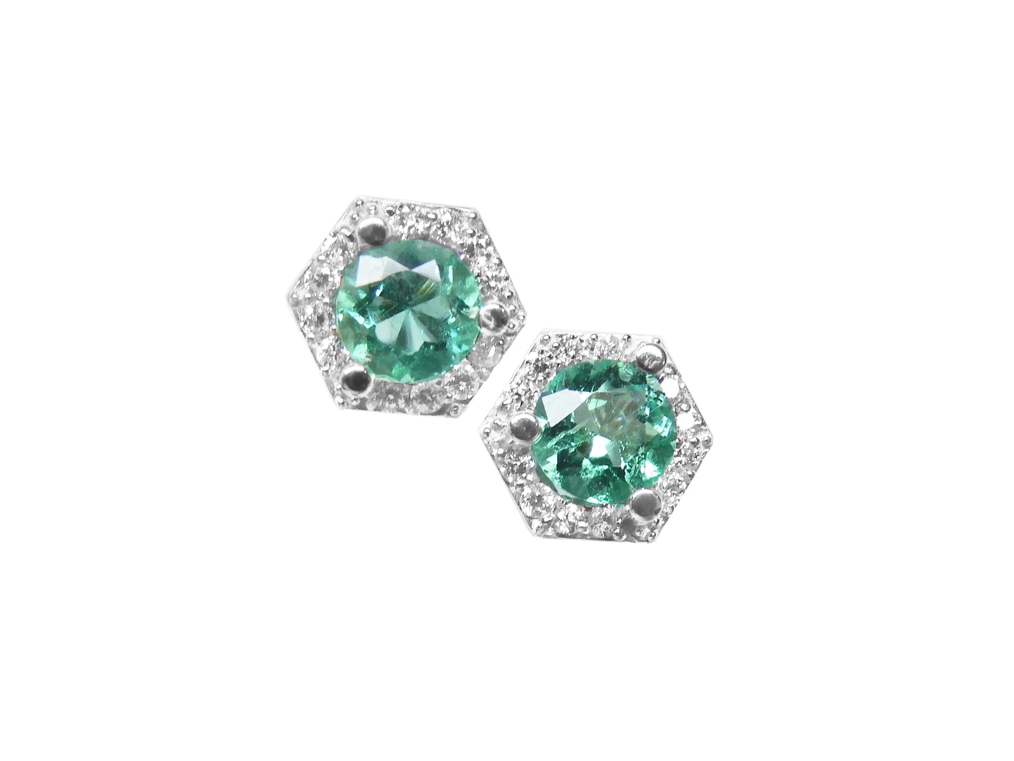 A pair of May birthstone emerald stud earrings, viewed on top side,