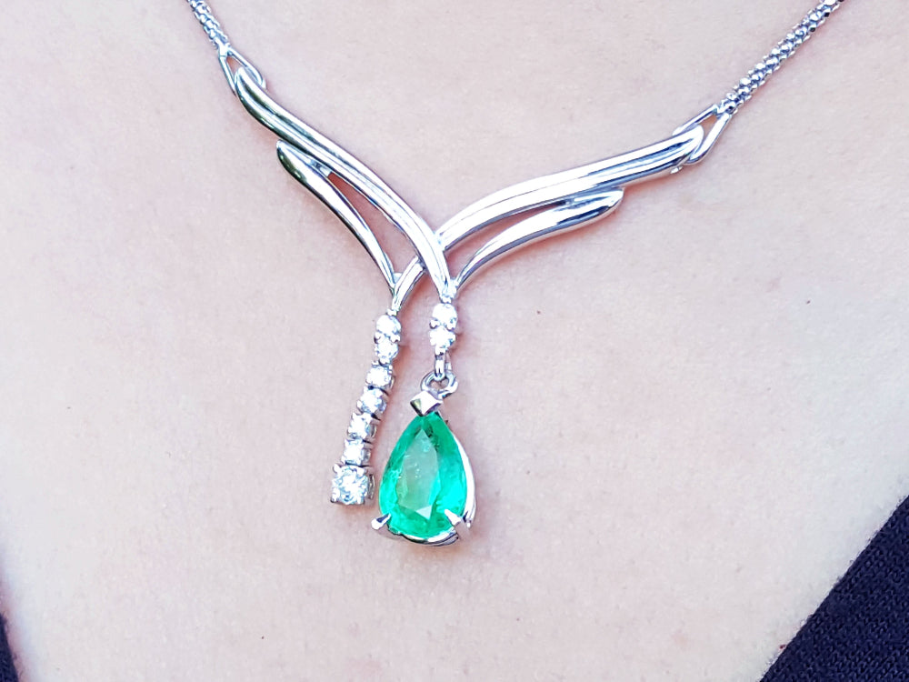 Emerald necklaces for women in USA natural pear cut sparkling medium green color 1.73 carats with accent diamonds