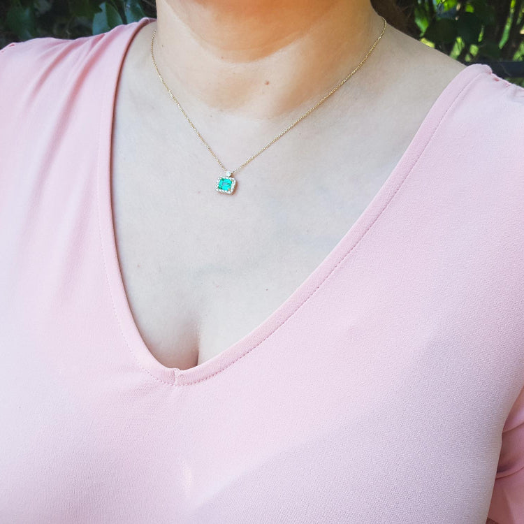Genuine emerald necklace fine jewelry east west orientation encircled in a halo of natural diamonds, crafted in 14k yellow gold
