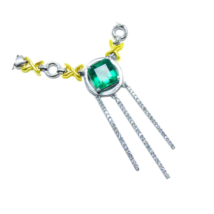 Muzo Colombian emerald kisses and hugs necklace with the meaning of love and hope, set in 14k white and yellow gold