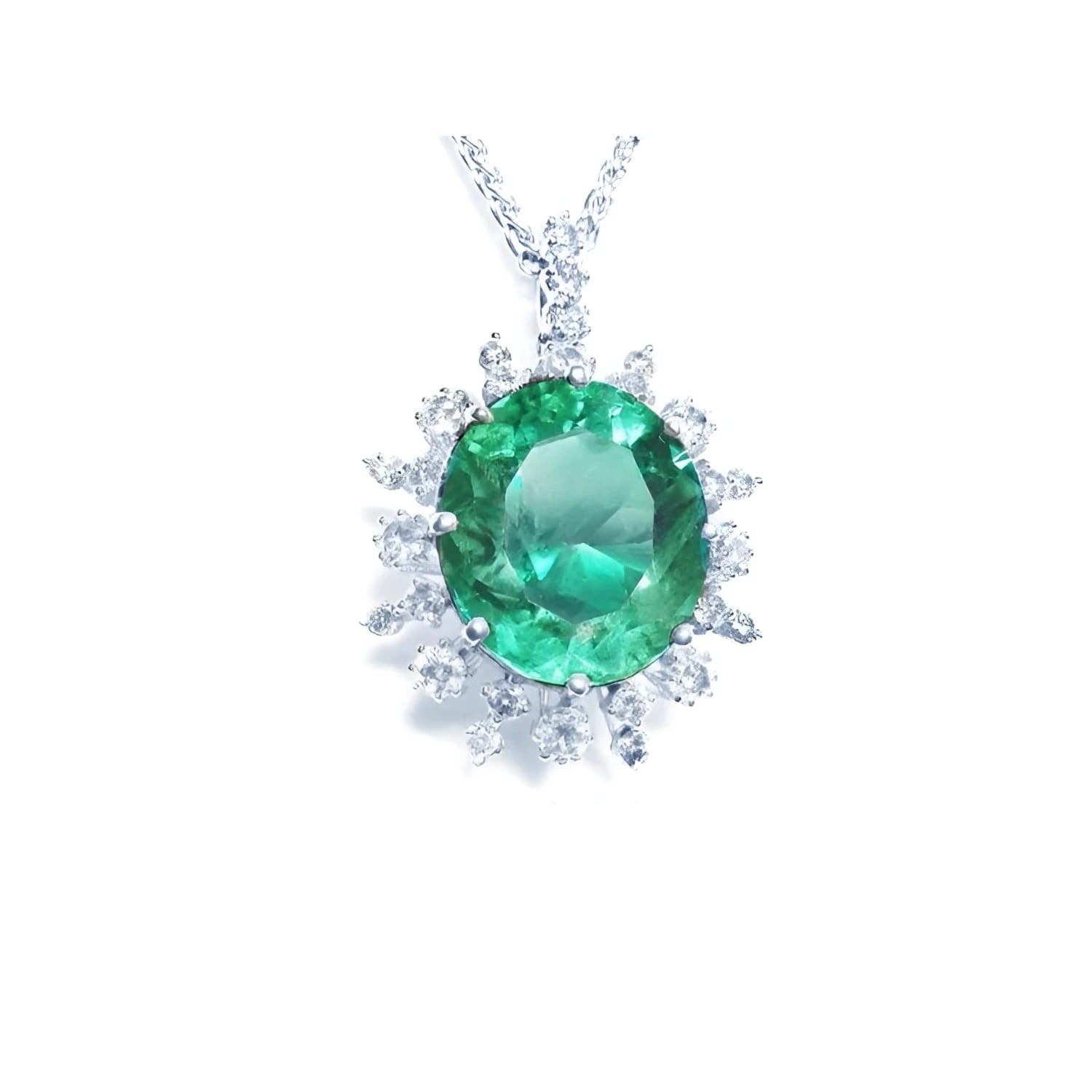 Oval cut medium light green emerald pendant with diamond halo in 14K white gold.