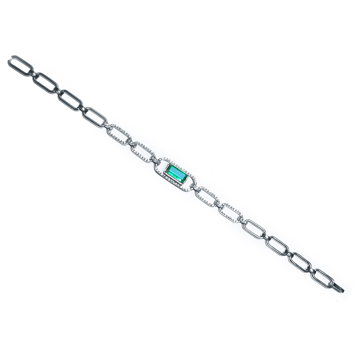 A distant view of a paperclip style bracelet with a natural emerald on a white background.