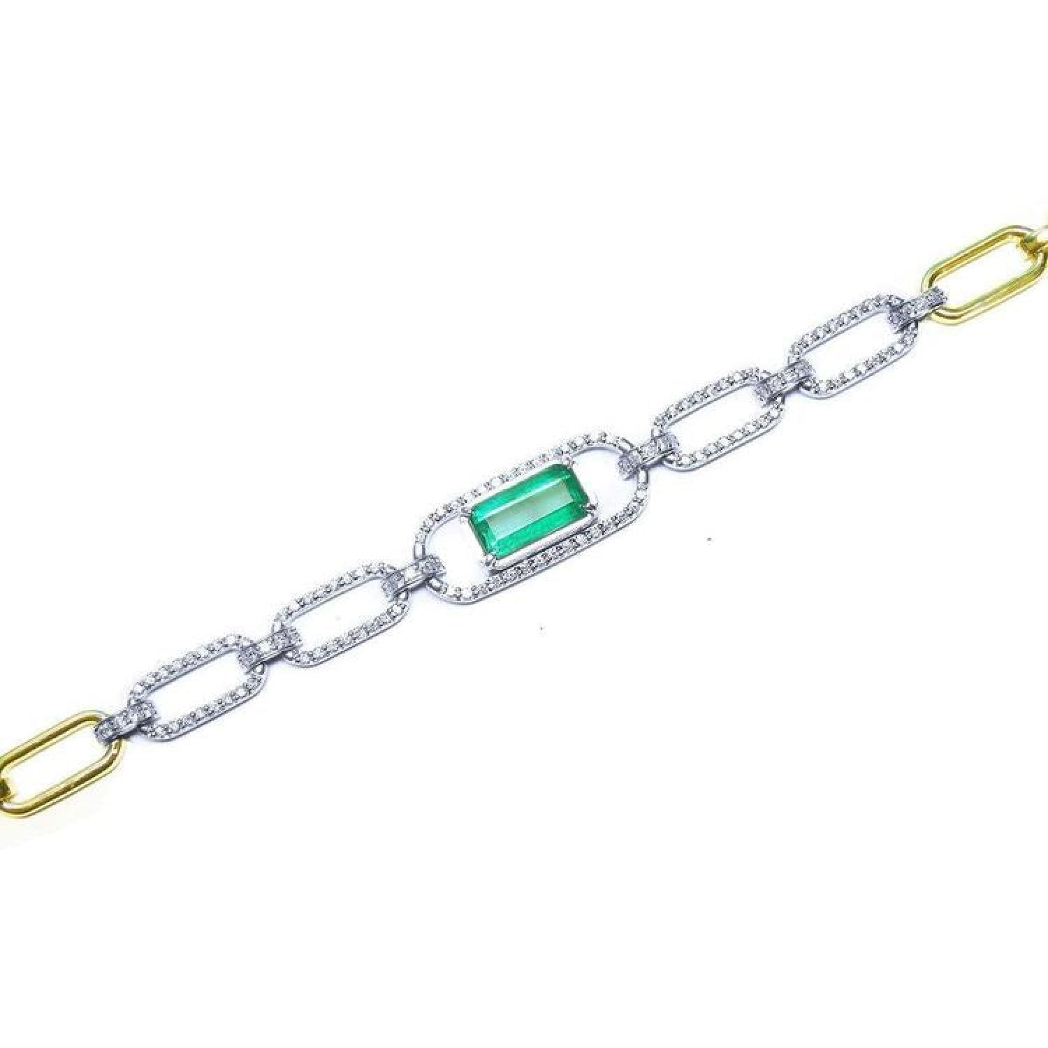14K white and yellow gold paperclip bracelet with an emerald-cut green emerald and diamond halo.