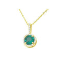 Round cut Colombian emerald pendant necklace with halo diamonds in 14K gold.