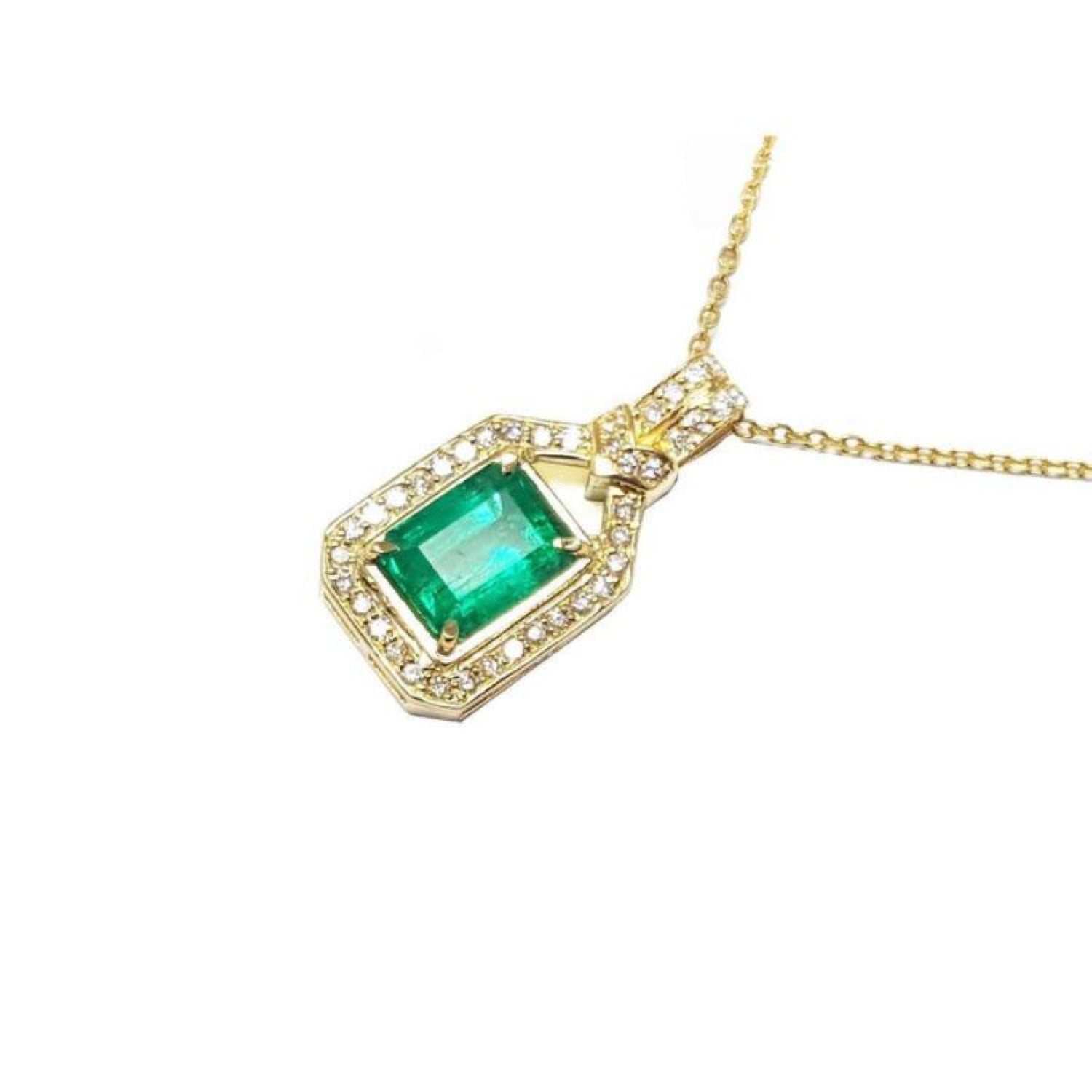 2.06 ct. emerald pendant with natural diamonds in 18K yellow gold, featuring an emerald-cut gem.