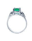 an emerald platinum ring lateral top and gallery view.