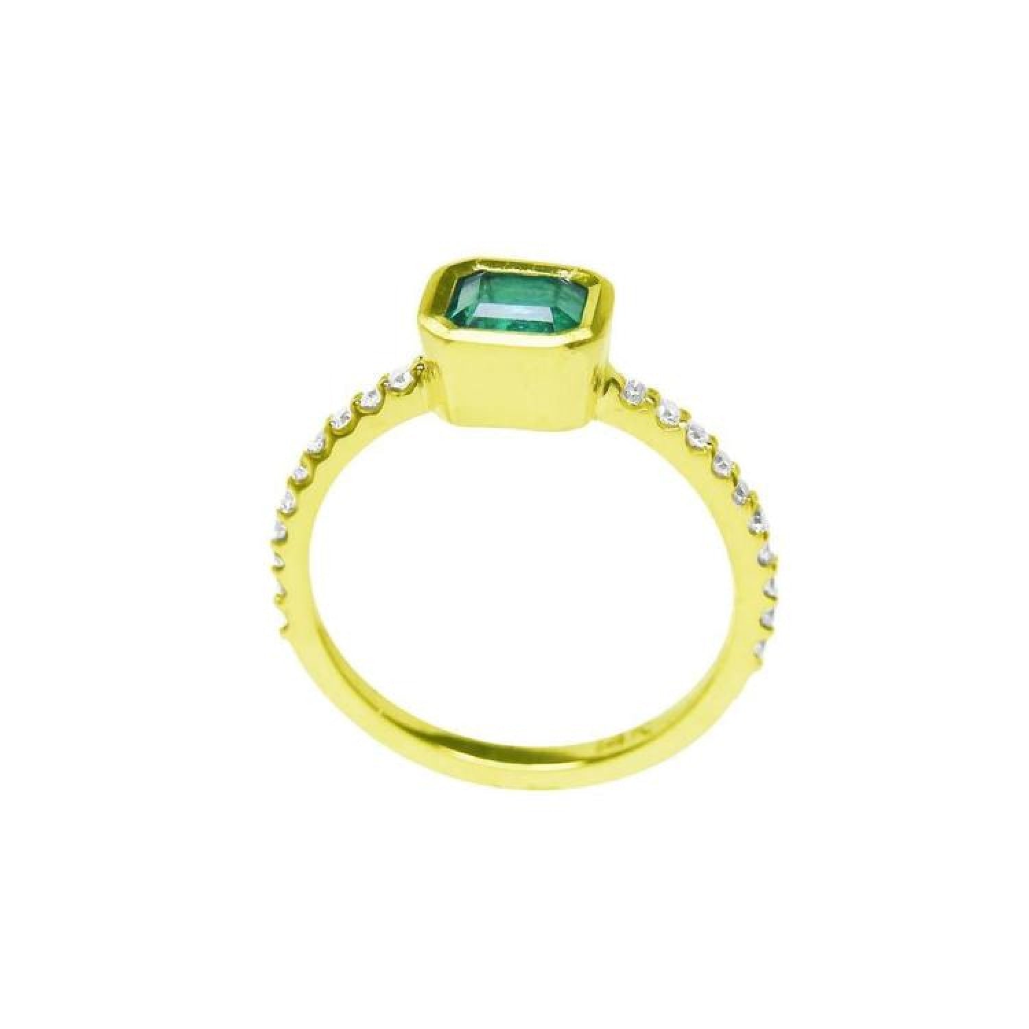 14K yellow gold ring with a bezel-set emerald and accent diamonds on the band.