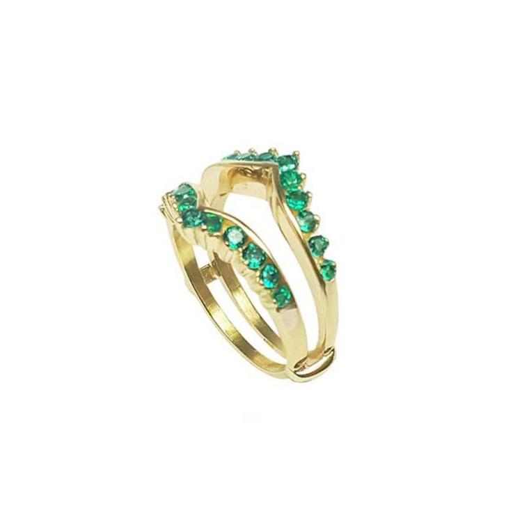 A yellow gold emerald enhancer ring displaying its half side perspective position.