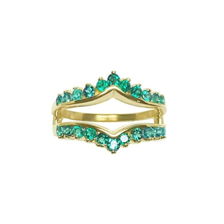 A yellow gold emerald ring guard to insert a solitaire engagement ring frontal view.