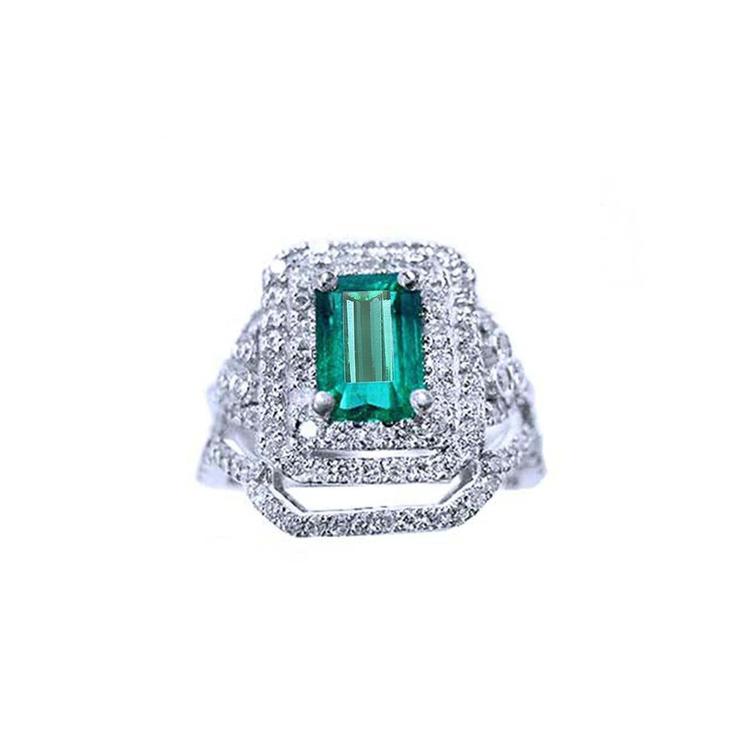 Natural Colombian emerald ring with double halo diamonds and matching band 14k white gold.