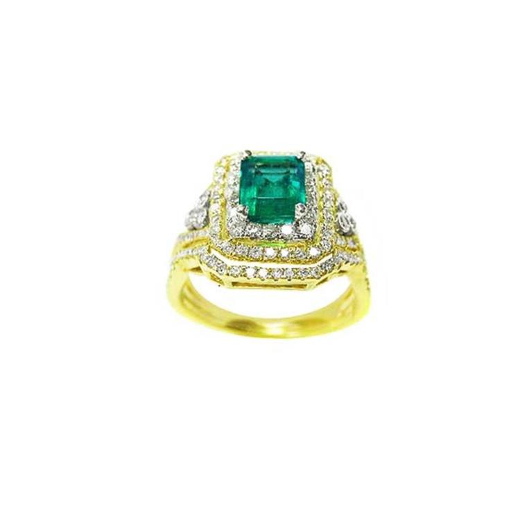 1.31 ct emerald-cut emerald ring with double halo diamonds and matching band in 14K yellow gold.