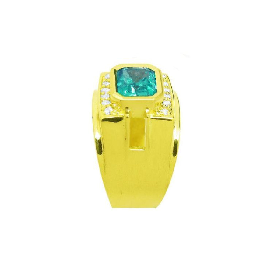 Men's 18K yellow gold ring with a vibrant emerald-cut Colombian emerald and diamond accents.