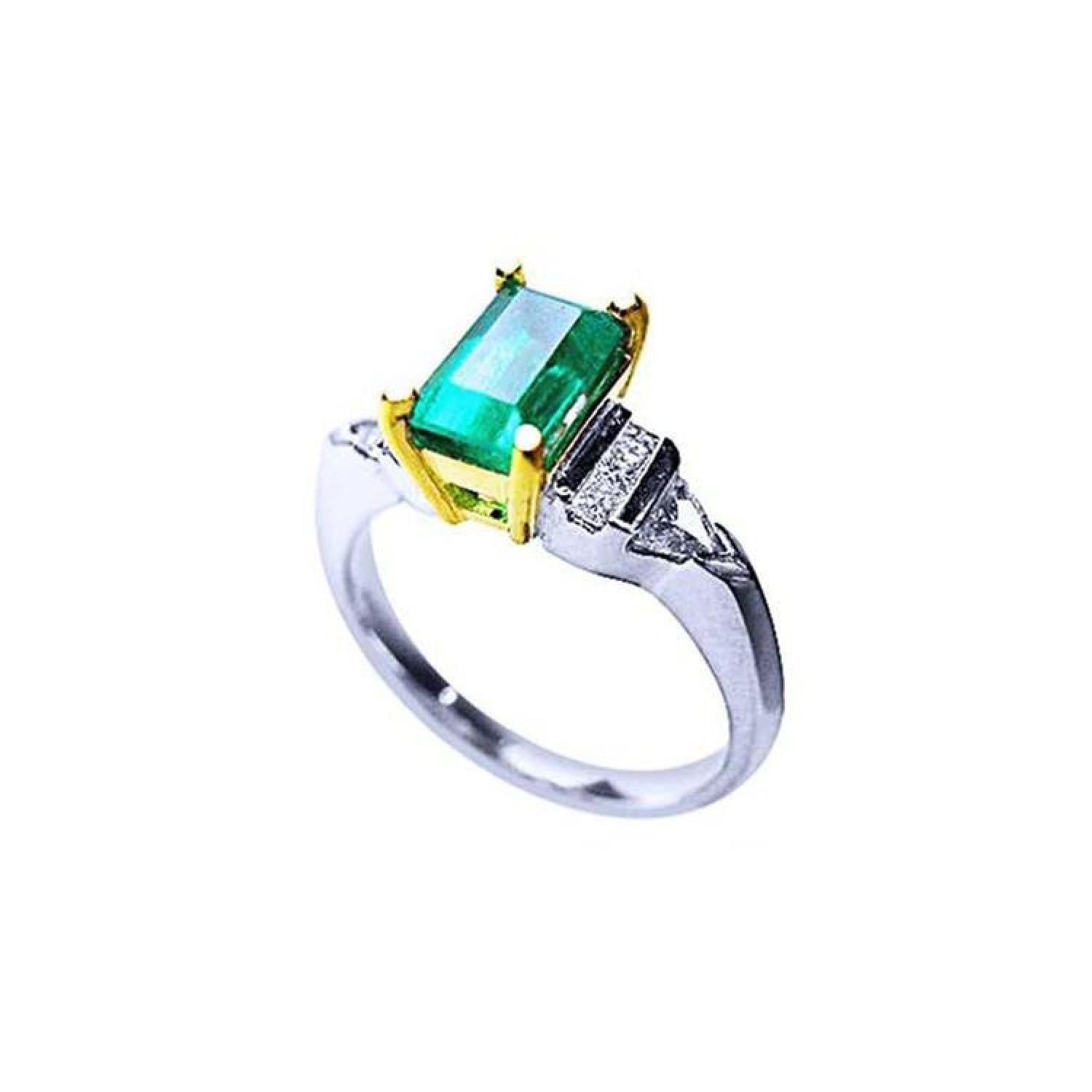 Platinum ring with 1.21 ct. emerald in 18K yellow gold setting, accented by natural diamonds.