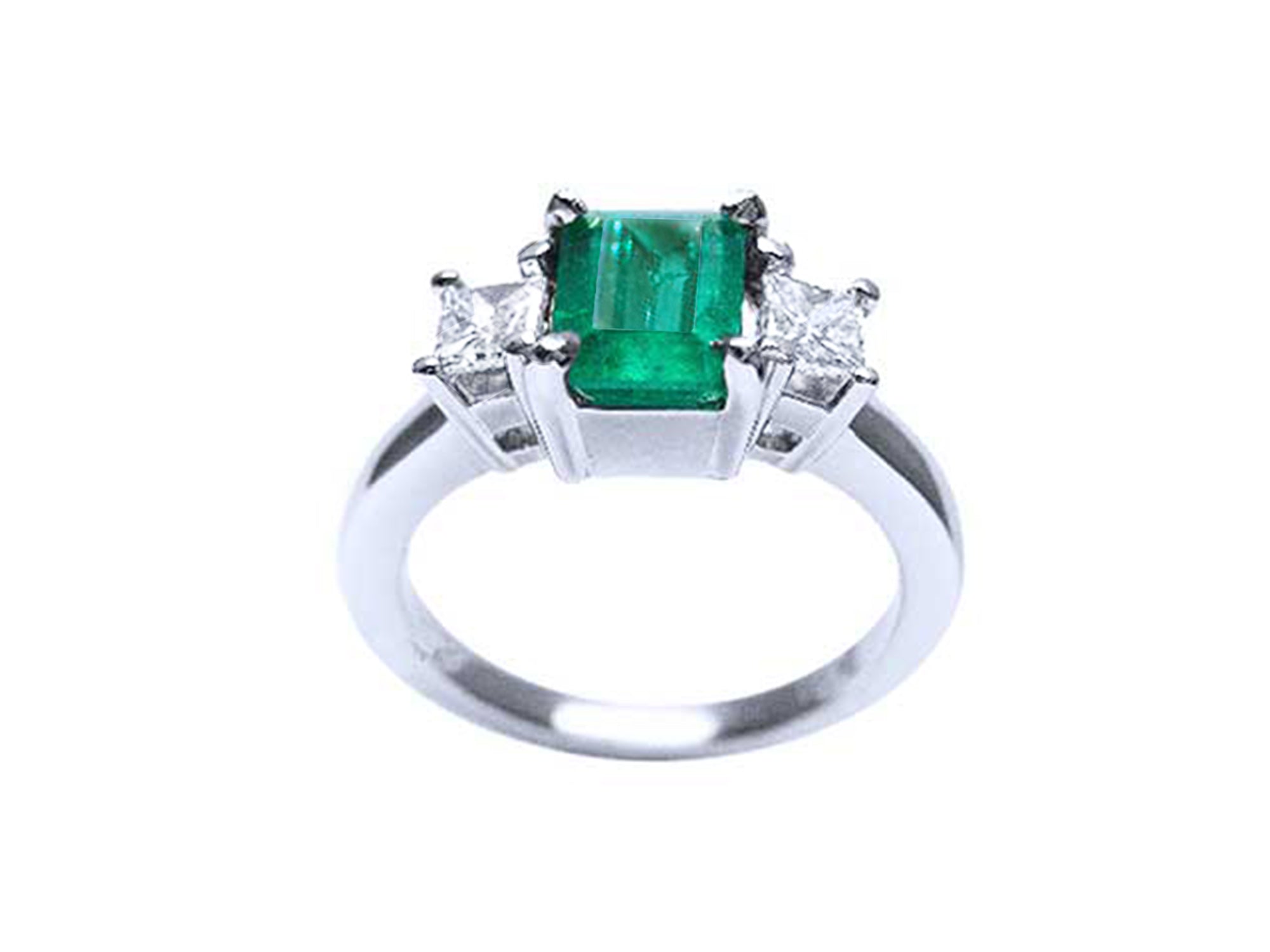 This three stone emerald and side princess cut diamond ring is displaying the top and gallery profile.