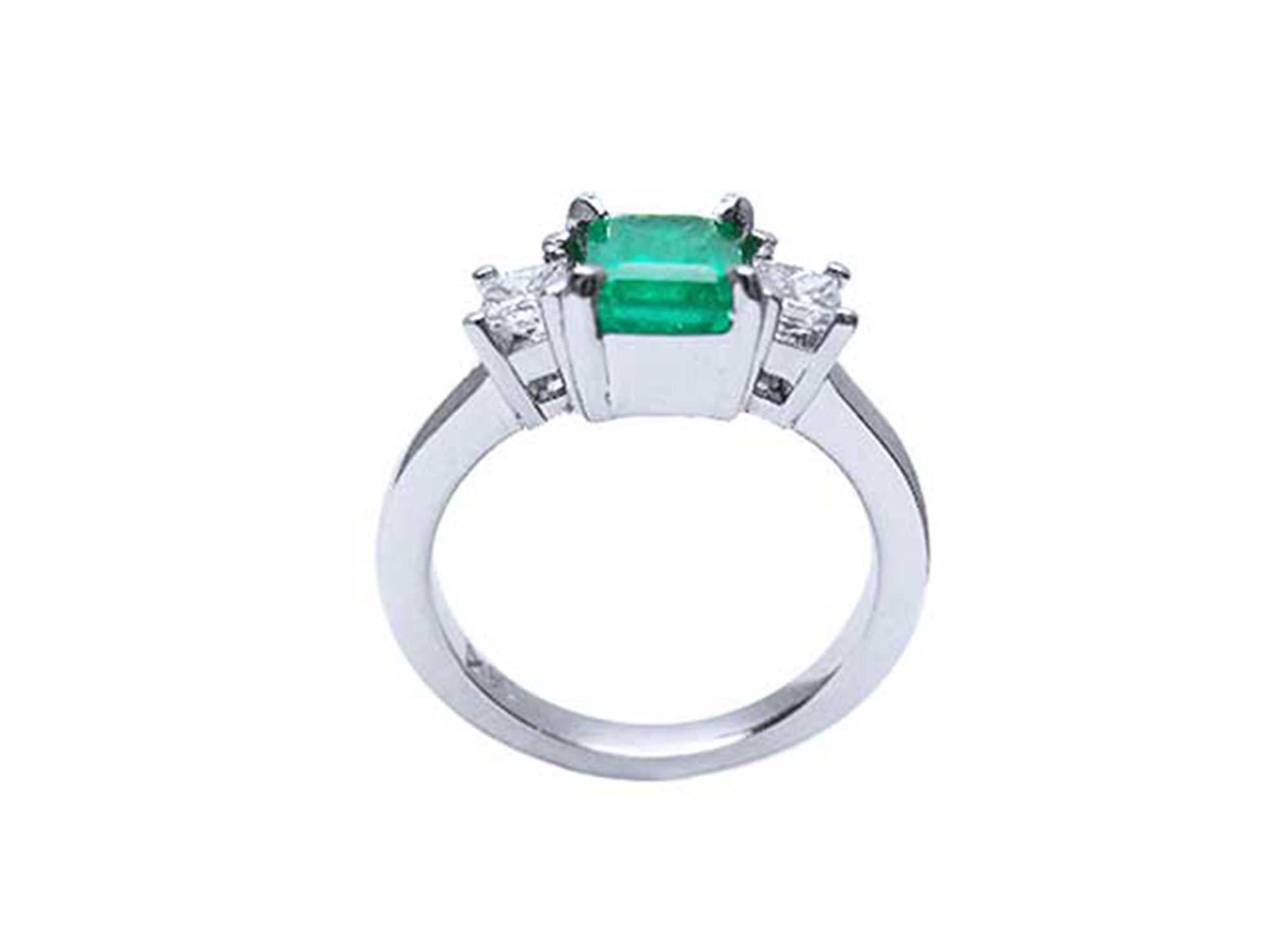 A white gold emerald and diamond ring with the top, gallery and band lateral profile view.