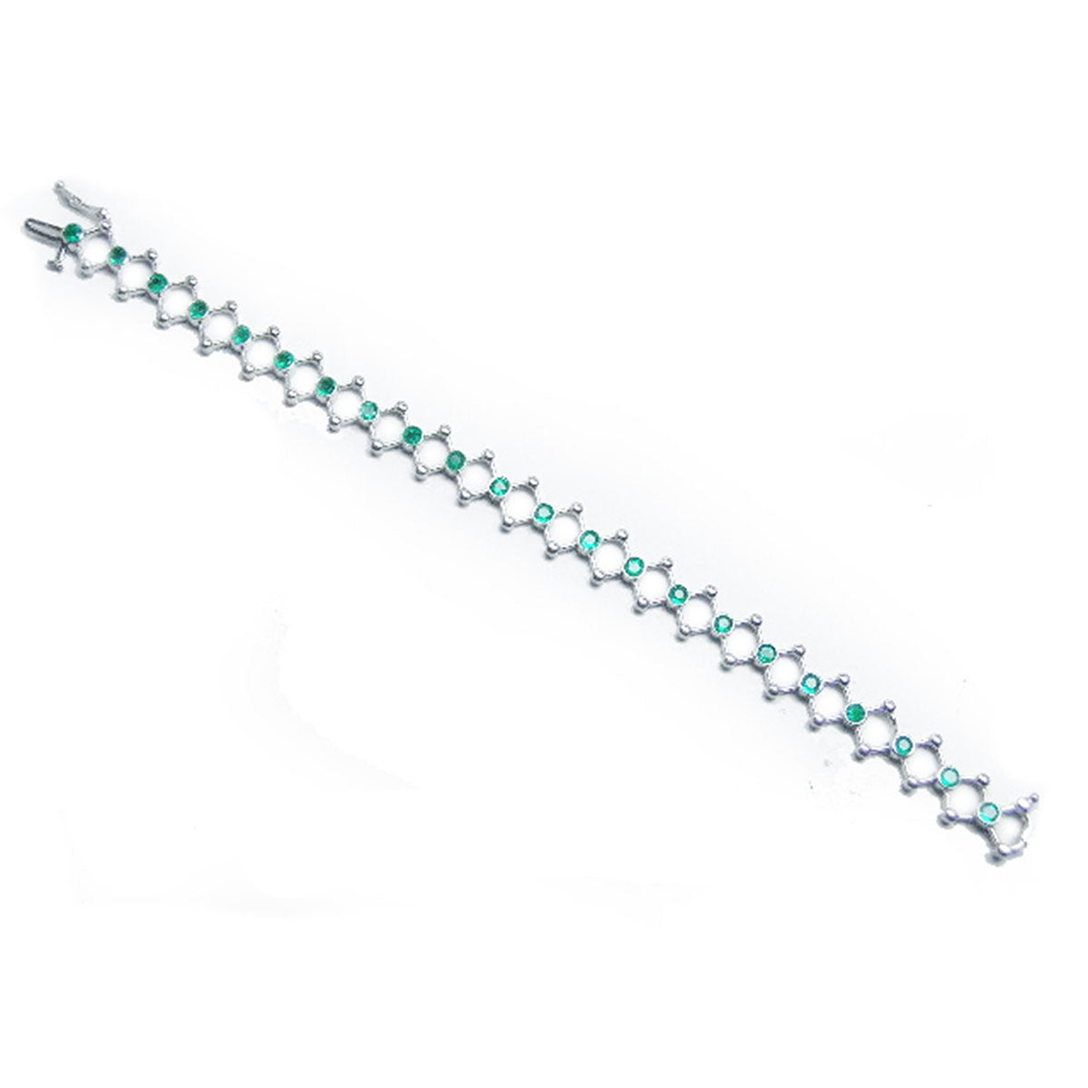 A distant view of a white gold bracelet with natural colombian emeralds round cut.
