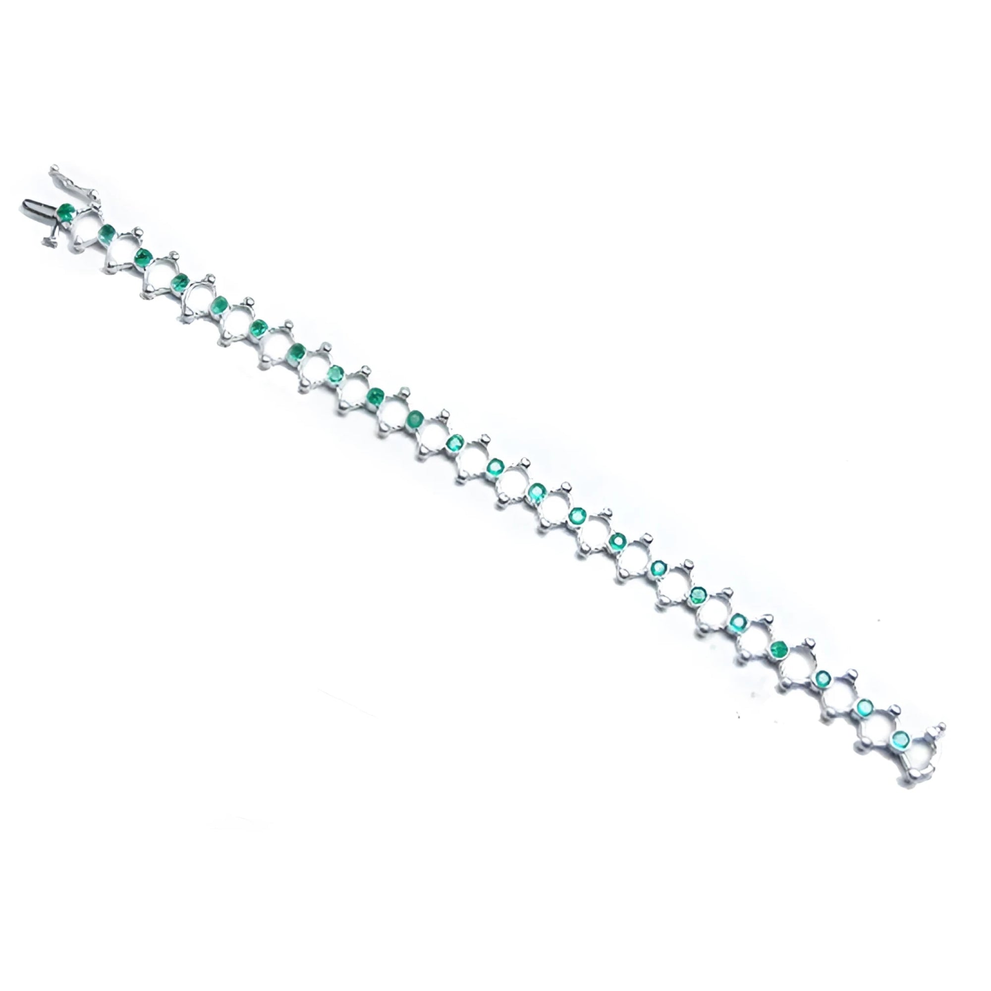 14K white gold bracelet with round Colombian emeralds bezel-set in diamond-shaped links.