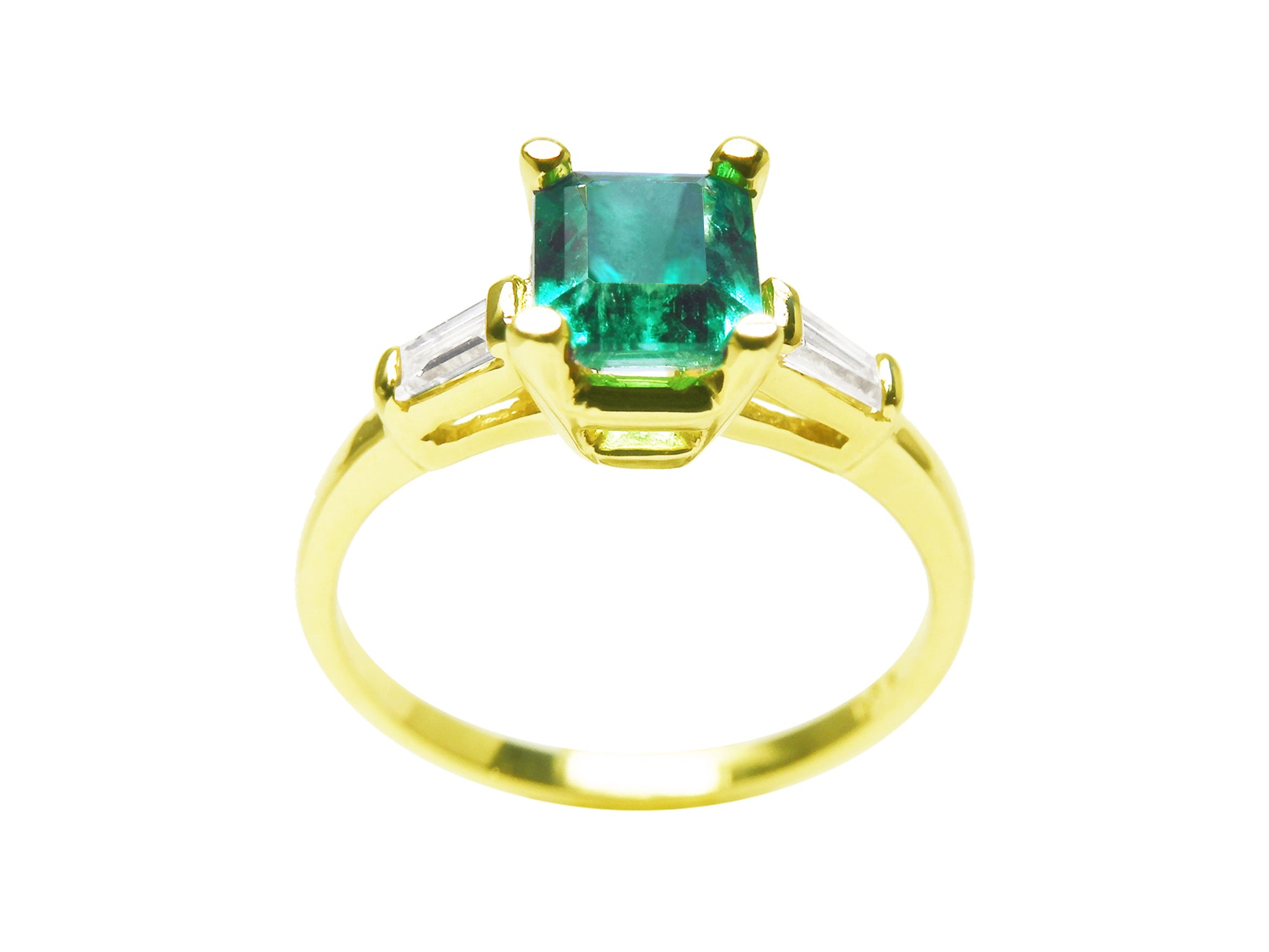 A natural emerald with side baguettes diamond ring yellow gold, topside and lateral profile view.