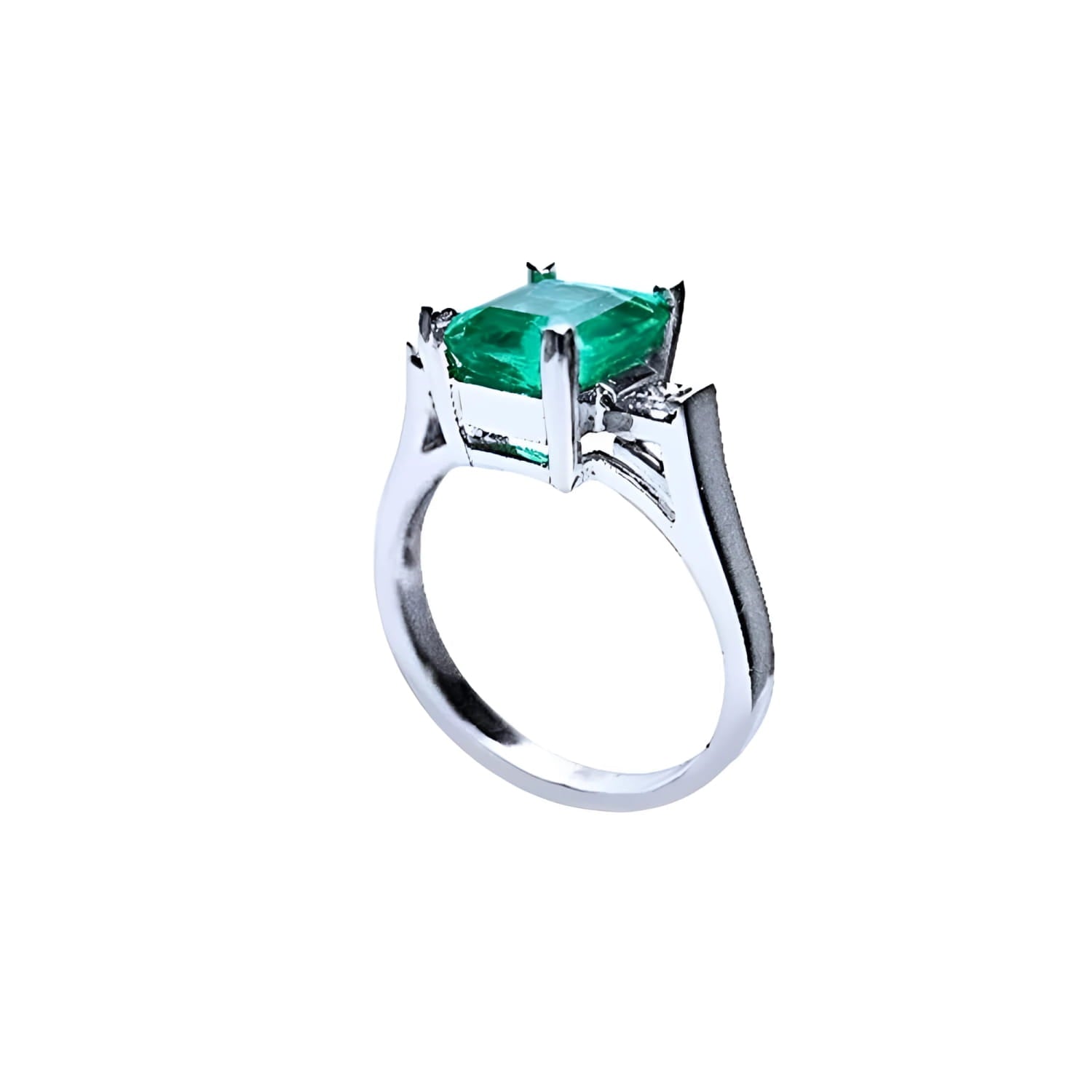 1.56 ct emerald ring with princess-cut side diamonds in 14K white gold.