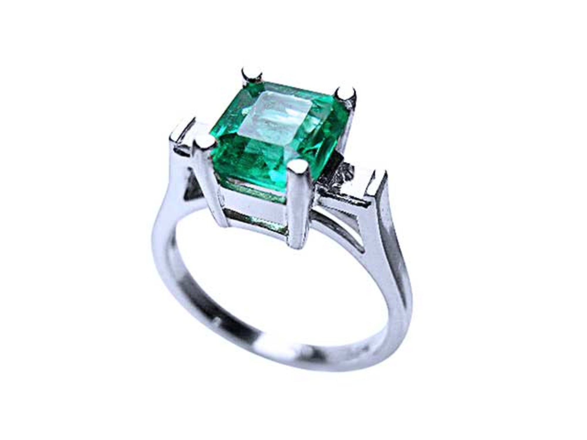 This colombian emerald ring displays the top and partial lateral side.
