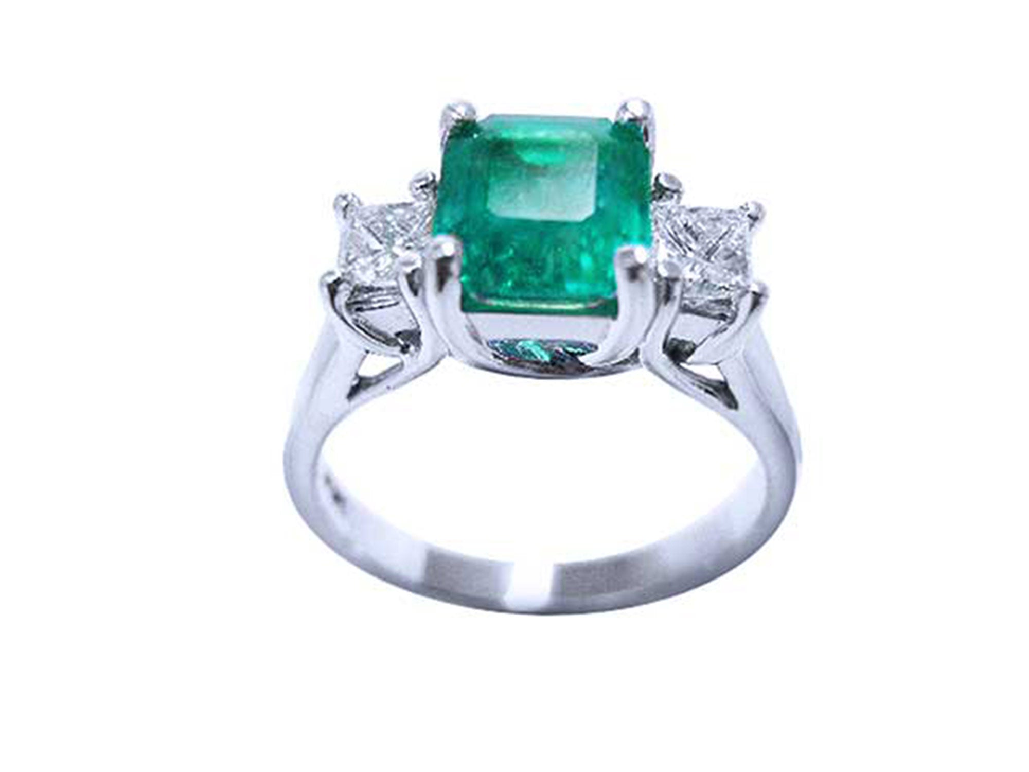This emerald and princess cut side diamonds ring displays the top and gallery view profile.