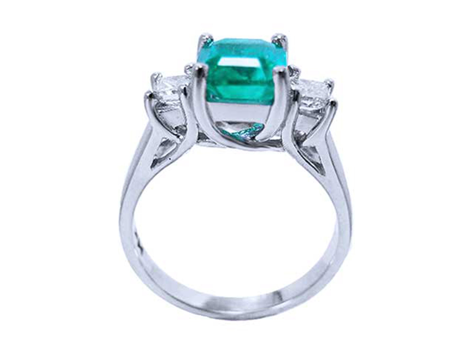 A natural emerald and diamond side princess cut ring on a lateral position, top and gallery profile view.