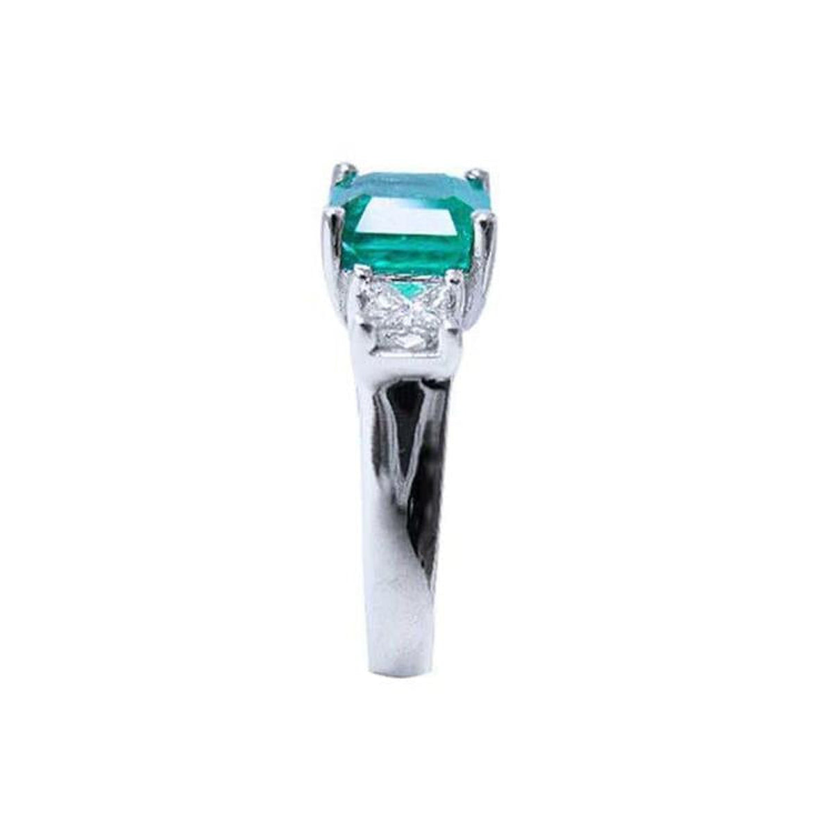 1.62 carat emerald engagement ring in 14k white gold with side princess cut diamonds.