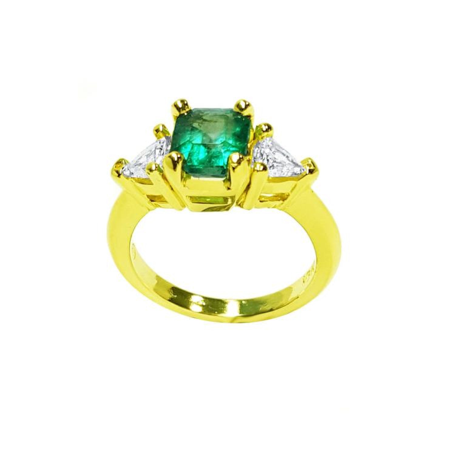 18k gold ring with a 1.51 ct. emerald and two trillion-cut side diamonds.