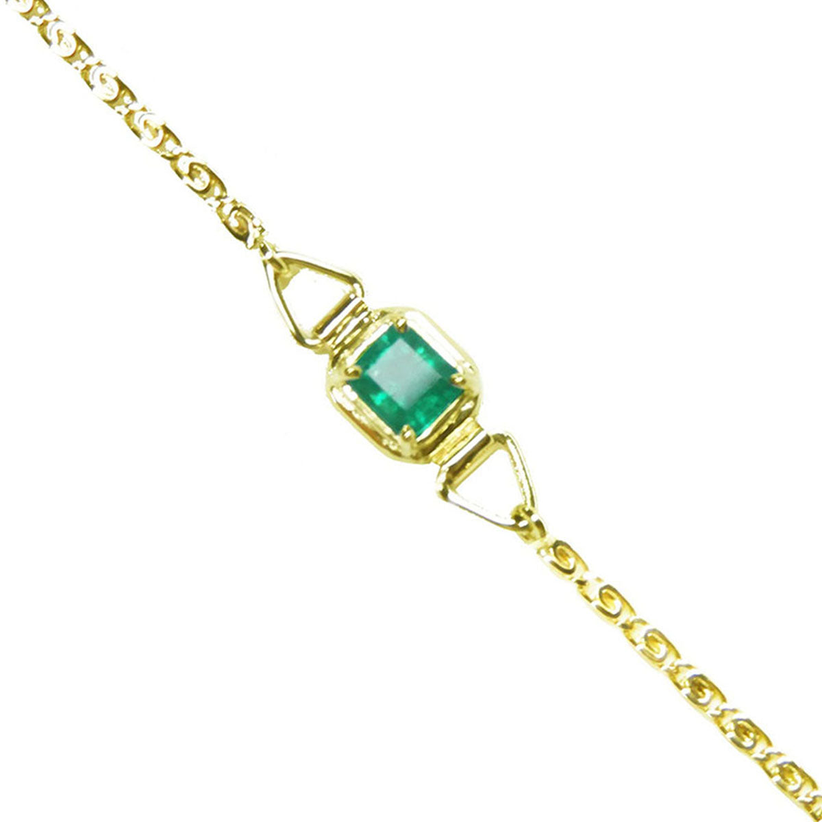 The topside view of a square emerald solitaire bracelet prong set in 14k yellow gold.