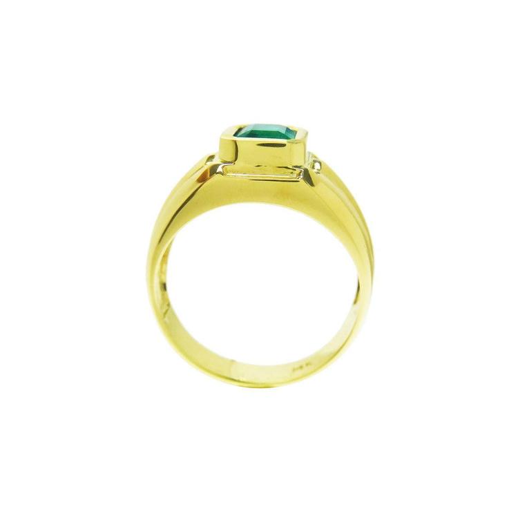 Men's 14K yellow gold solitaire ring with a bezel-set deep green Colombian emerald.