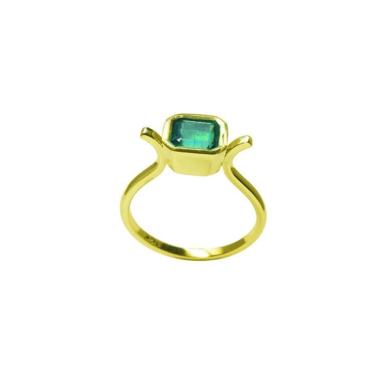 0.81 ct. emerald solitaire ring, bezel set in 14K yellow gold with a medium bluish-green emerald.
